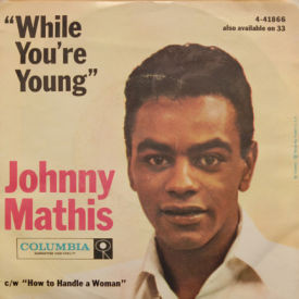 Johnny Mathis - While You’re Young/How To Handle A Woman